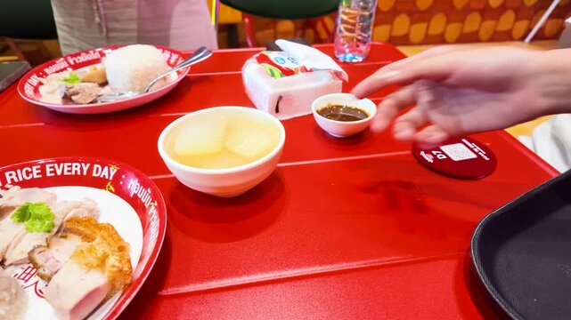 Serving Traditional Thai Khao Man Gai Chicken Rice in Bangkok
