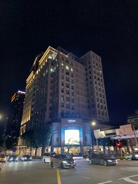 Bugis junction towers facade at night in Bugis, Singapore