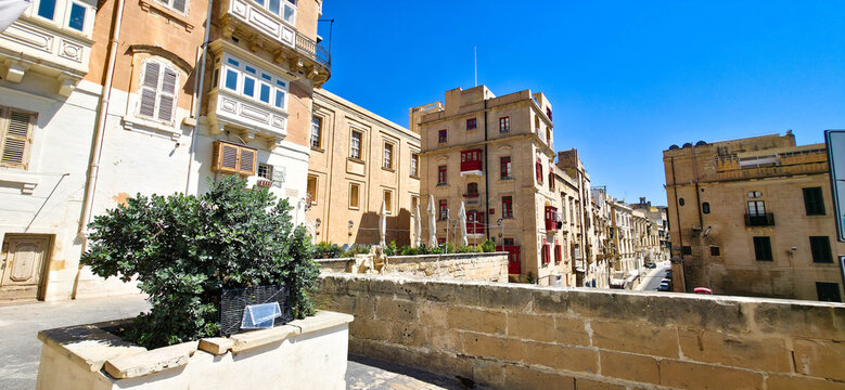 Neighborhood overlooking the stone pedestrian footbridge spanning Liesse Street, near Victoria Gate. Valletta, Malta
