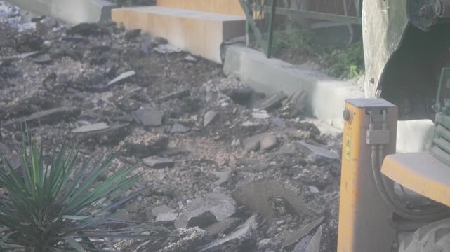Powerful Concrete Cutting Saw Demolishes Curb Slab During Road Construction