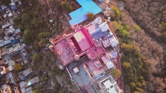 Beautiful Aerial View of Shri Radha Rani Temple in Barsana During Holi Showing a Massive Colorful Gathering, Gulal Clouds, Historic Temple Architecture and Sacred Braj Landscape