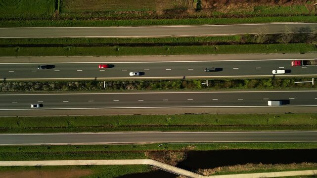 Belgium&rsquo;s E34 Highway: Aerial Footage of Vehicles and Green Surroundings