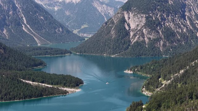 Plansee turquoise alpine lake Ammergau Alps Reutte district of Tyrol, Austria