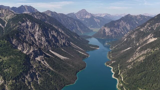 Aerial above Ammergau Alps alpine Plansee lake turquoise color Reutte Tyrol district Austria