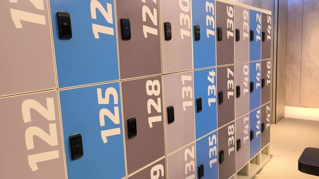 Rows of colorful numbered lockers in a clean modern changing room creating an organized secure and practical storage environment