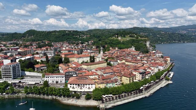 Aerial Pullback from Arona City on Lake Maggiore in Italy - Sunny Day