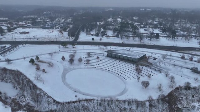 Aerial orbit of Wilma Rudolph Event Center in Clarksville TN, after a snowstorm