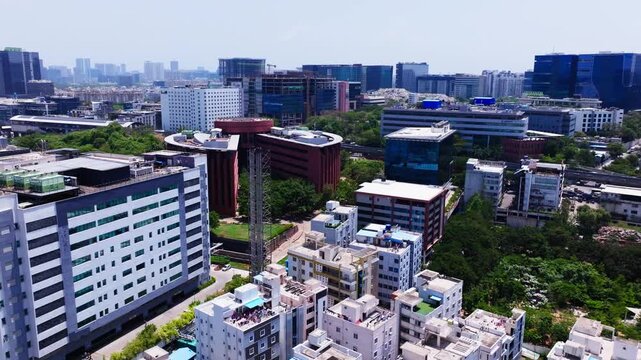 TCS Deccan Park building with Maximus 2B building, IT park and residential buildings at HUDA Techno Enclave, hitec city, hyderabad, telangana, india. day time, crane shot, drone shot, 4k.