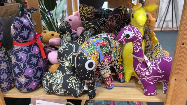 Animal toy plushies made from traditional Malaysian batik fabric. These colorful handcrafted items make ideal souvenirs and decorative displays.