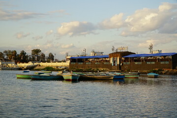 Traditional wooden fishing boats moored on Lake Timsah in Ismailia, Egypt © ahmedfawzyelaraby