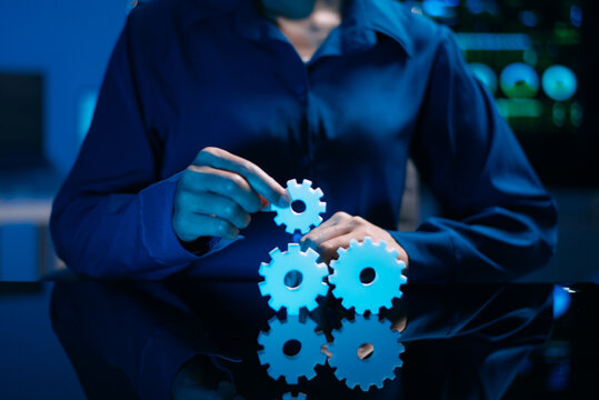 Business hands and collaboration concept with connected gears, symbolizing partnership, communication, innovation, strategy, coordination,