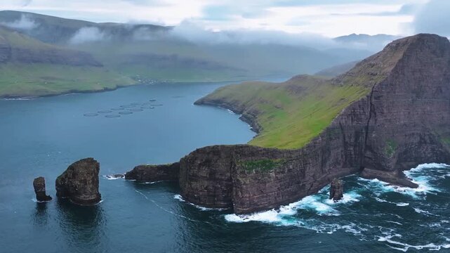 Aerial View of Risin og Kellingin Sea Stacks and Fjord in Faroe Islands