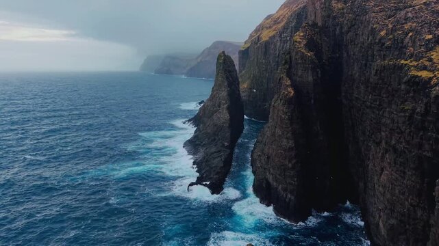 Aerial View of Geituskorardrangur Sea Stack and Cliffs in Faroe Islands