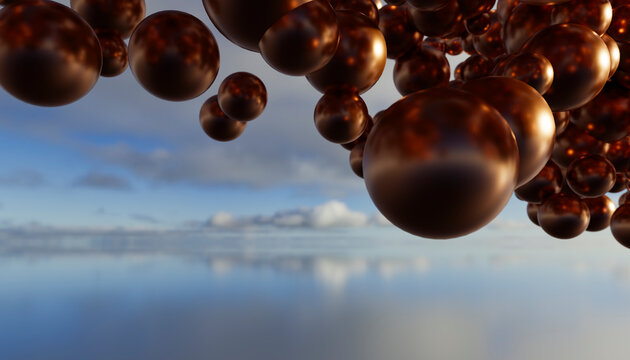 Reflective brown spheres float above calm water with sky reflections