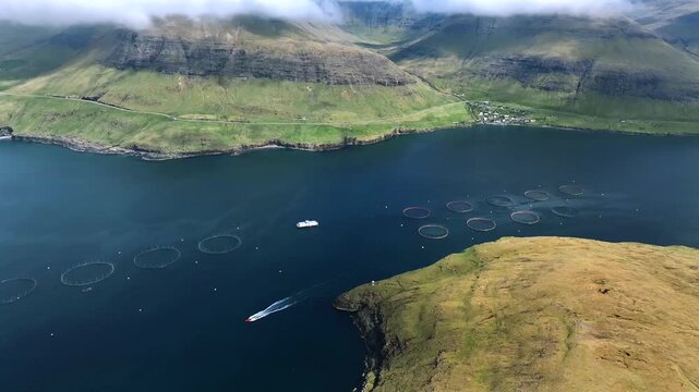 Aerial View of Salmon Farm and Speedboat in Faroe Islands