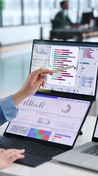 Data Analyst Woman Reviewing Financial Dashboard On Laptop