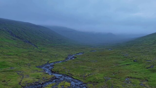Aerial View of Stream and Valley Near Foss&aacute; Waterfall in Faroe Islands