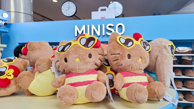 Miniso Store Interior Display Featuring Sanrio Hello Kitty Tan Swimsuit Plush Toy Dolls on August 17, 2026 in Bangkok,  Thailand 

