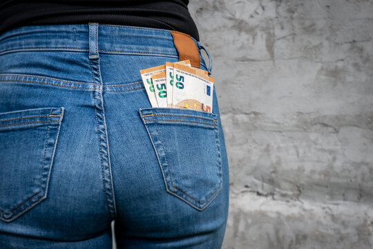 Euro Cash Protruding from a Jeans Pocket Suggests Undeclared Business Income