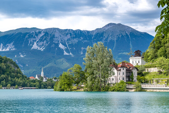 Lake Bled features a scenic mountain landscape and historic church