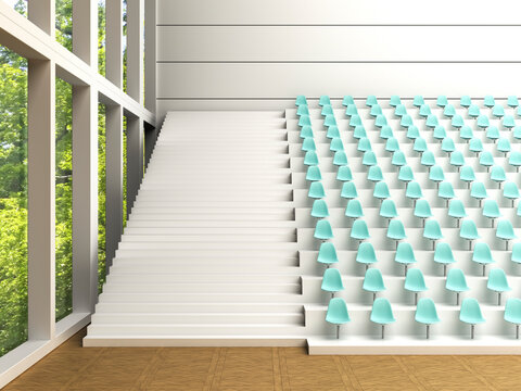 Modern lecture hall interior with rows of blue seats and large windows