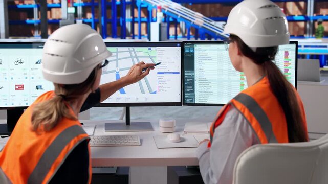 Woman Manager Plans Delivery Routes Using Software