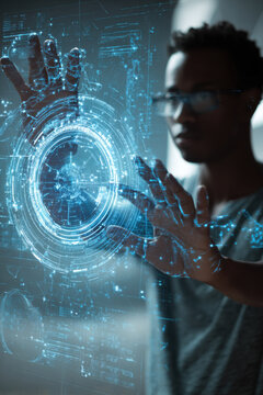 Man interacting with a futuristic holographic interface displaying complex data