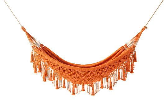An orange woven macrame hammock featuring fringe tassels suspended by hanging ropes.
