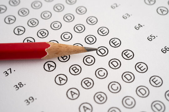 Answer sheets with pencil drawing fill to select choice, education.
