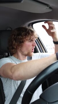 Vertical screen driver becomes extremely nervous and loses his temper behind the wheel after another motorist cuts him off during a tense drive through busy urban traffic
