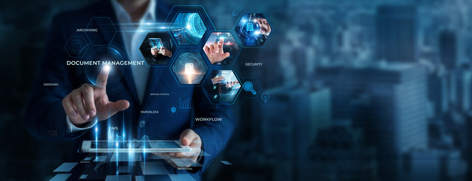 Businessman Using Tablet for Analyzing Document Management Data. Organizing digital files, improving information control, managing business records, efficient document processing systems.