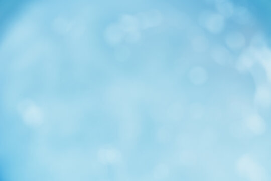 Abstract pastel sky blue gradient background with soft blurred bokeh lights and copy space, perfect for healthcare, dentistry, beauty cosmetics, clean water concept, winter promo, and serene design.