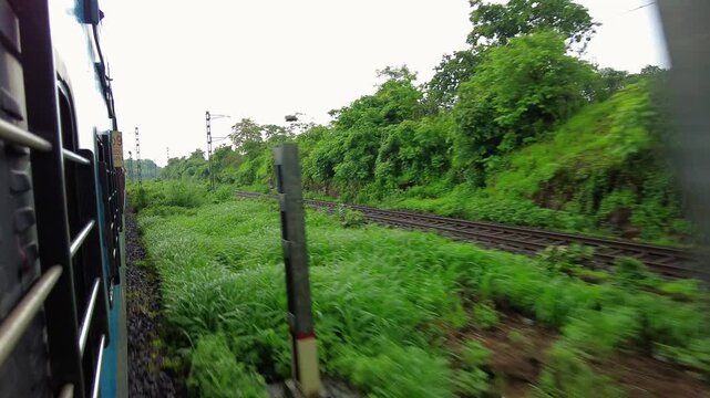 Passenger Train Window View During Konkan Railway Journey