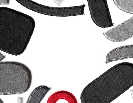 Abstract charcoal shapes with a single red circular accent