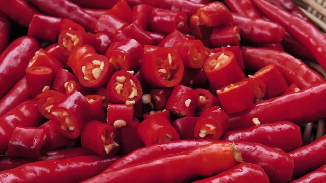 Sliced fresh red chili peppers in a basket