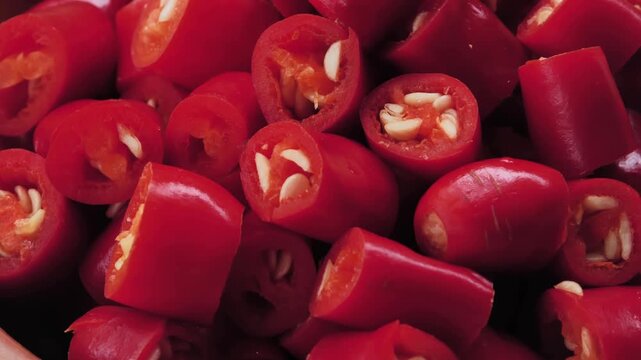 Sliced fresh red chili peppers in a basket