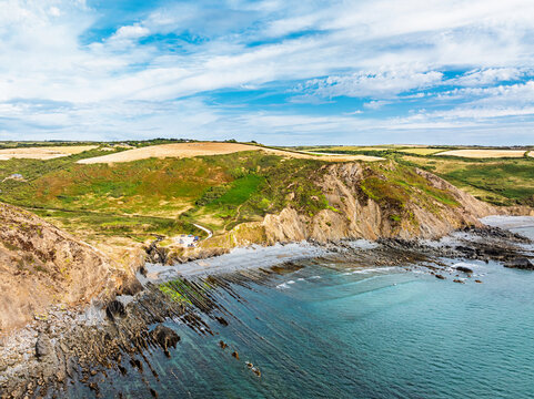 Cliffs and Fields over Welcombe Mouth Beach from a drone, North Devon and Cornwall Coastpath Border, Devon, England, Summer 2026
