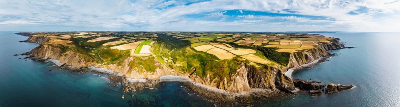 Panorama of Cliffs and Fields over Welcombe Mouth Beach from a drone, North Devon and Cornwall Coastpath Border, Devon, England, Summer 2026