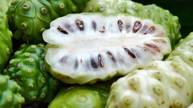 Fresh Noni Fruit in a Woven Basket	