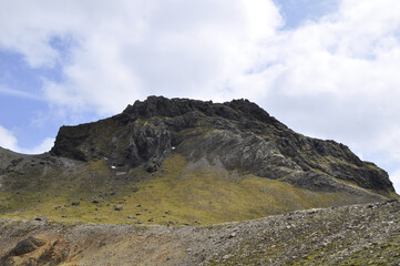 mountain landscape with blue sky and clouds in Iceland © Gaetan