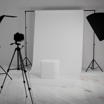 Modern photography studio backdrop with lighting equipment for product display. Professional photo studio setup with white backdrop podium and softbox lights 3D render cgi

