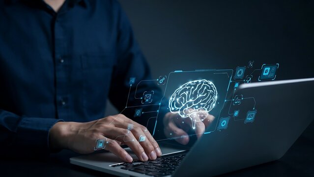 Professional man working on a laptop computer with a glowing digital brain interface hologram representing artificial intelligence and advanced machine learning analytics technology concepts