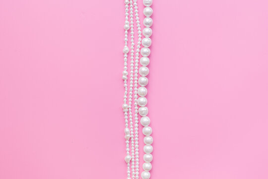 Natural white pearls - beads for jewelry, top view. Precious and elegance concept background