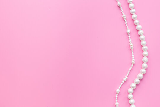 Natural white pearls - beads for jewelry, top view. Precious and elegance concept background