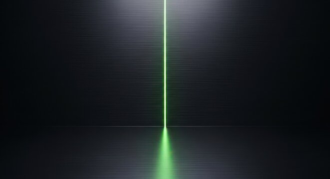 Minimalist dark background, featuring a single, vertical glowing green, laser beam line, centered on a, textured metallic surface, creating a sharp, contrast between light, and deep shadows, in a