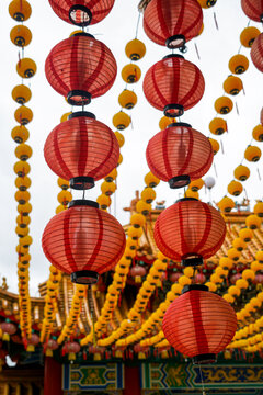 Detail of strings of red lanterns and yellow lanterns, Thean Hou temple, Kuala Lumpur, Malaysia