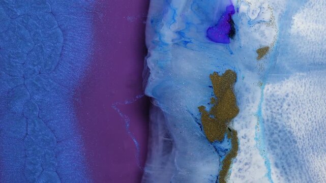Mixing colored alcohol inks with epoxy resin for art creation