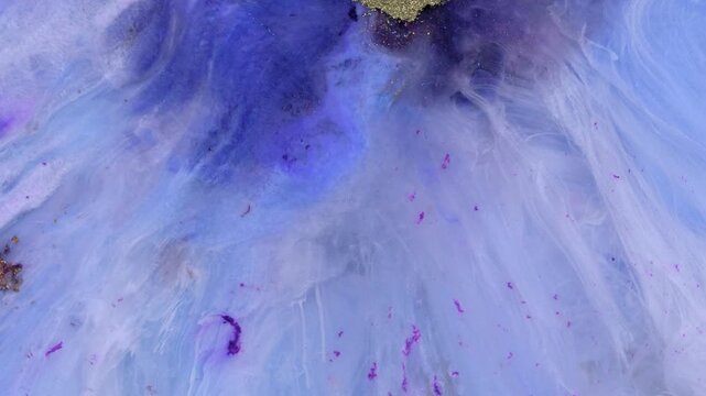 Mixing alcohol inks with epoxy resin in a close-up view of different colors