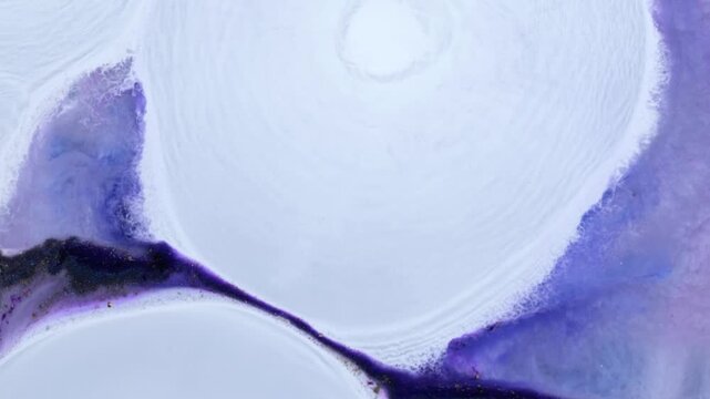 Mixing alcohol inks and epoxy resin in various colors for art creation