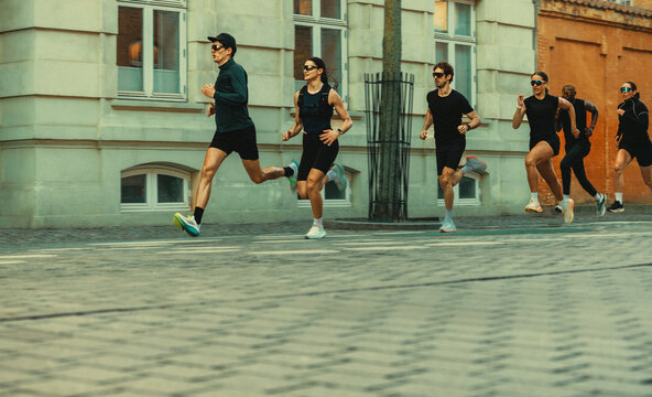 Club running brings a group together on a city street